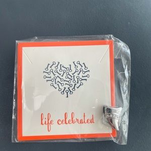 KEEP Collective Shark tooth charm.